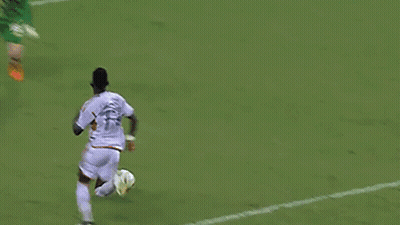 Soccer Player Number 18 Kicking Ball GIF