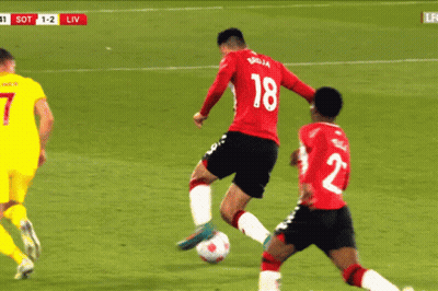 Soccer Player Number 18 Kicking Ball GIF