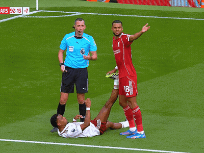 Soccer Player Number 18 Lying On Ground GIF