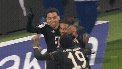Soccer Player Number 19 Hugging Another Player GIF