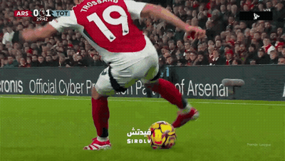 Soccer Player Number 19 Kicks Ball GIF