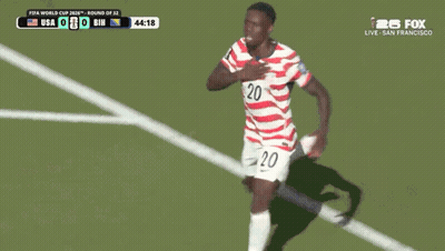 Soccer Player Number 20 in Front of Goal