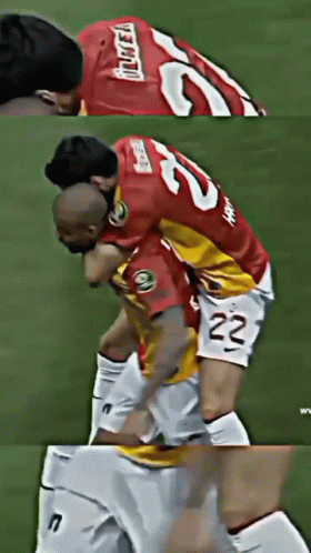 Soccer Player Number 22 Hugged By Teammate GIF