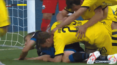 Soccer Player Number 23 Being Tackled GIF