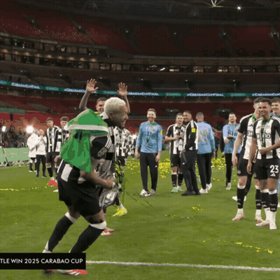 Soccer Player Number 23 Holding Trophy GIF