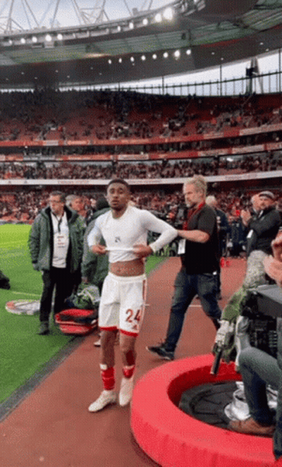 Soccer Player Number 24 Walking Off Field GIF