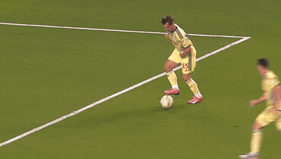 Soccer Player Number 25 Jumping To Catch Ball GIF