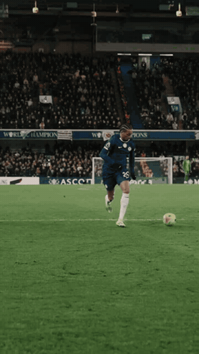 Soccer Player Number 26 Kicks Ball GIF