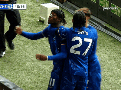 Soccer Player Number 27 Hugging Another Player GIF