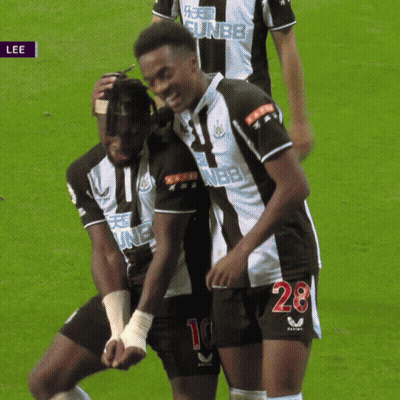 Soccer Player Number 28 Hugging Another Player GIF