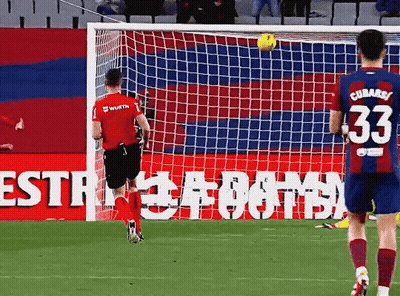 Soccer Player Number 33 Watching Ball Into Goal GIF