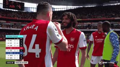 Soccer Player Number 4 Jersey Shakes Hands GIF