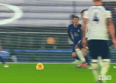 Soccer Player Number 4 Kicking Ball GIF