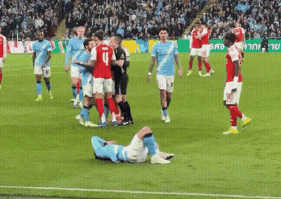 Soccer Player Number 4 Lying On Ground GIF