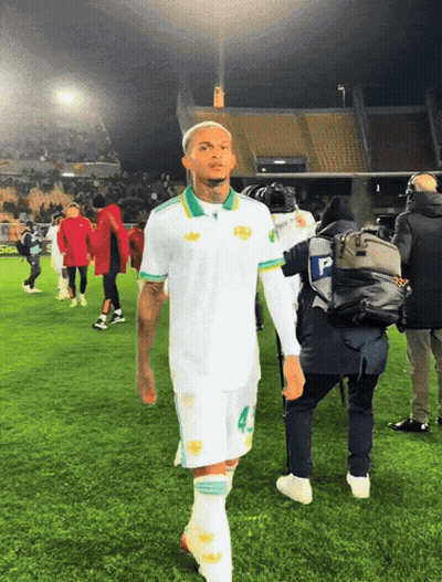 Soccer Player Number 4 Walking Off Field GIF