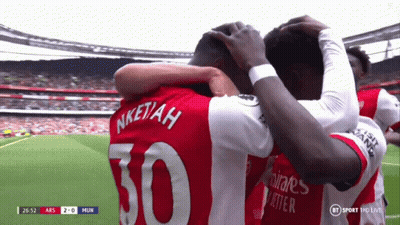 Soccer Player Number 50 Hugging Teammate GIF