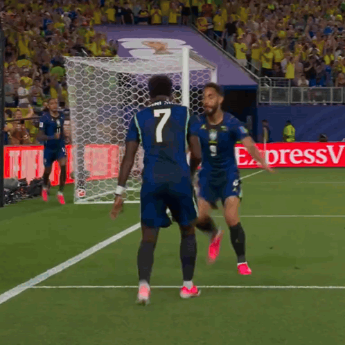 Soccer Player Number 7 Celebrating With Teammate GIF
