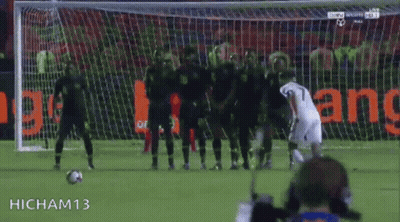 Soccer Player Number 7 Kicking Ball Into Goal GIF