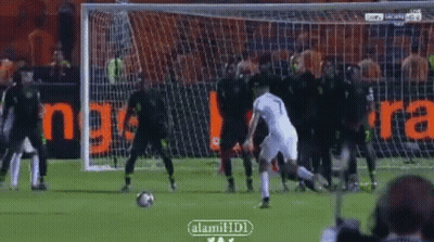Soccer Player Number 7 Kicks Ball GIF