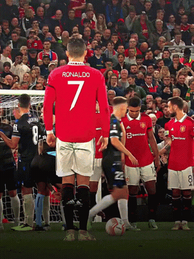 Soccer Player Number 7 Running In Front Of Crowd GIF