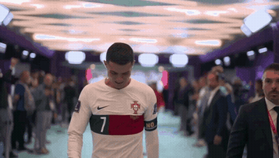 Soccer Player Number 7 Walking Through Crowd GIF