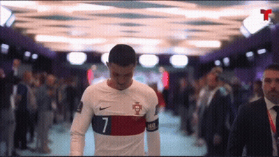 Soccer Player Number 7 Walking Through Crowd GIF