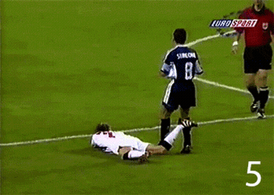 Soccer Player Number 8 Laying On Field GIF