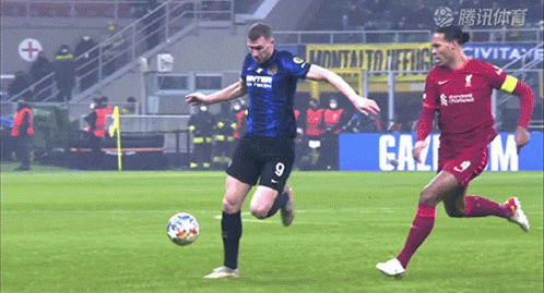 Soccer Player Number 9 Kicks Ball GIF