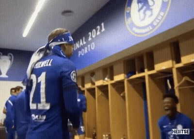 Soccer Player Number 9 Surrounded By Players GIF