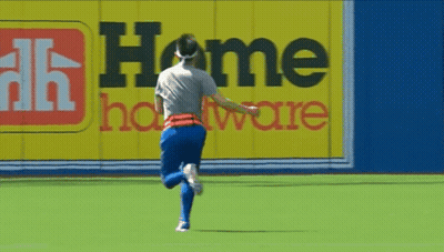 Soccer Player On Field By Home Hardware Sign GIF
