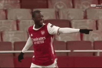 Soccer Player Pointing At Camera In Red Emirates Fly Better Shirt GIF