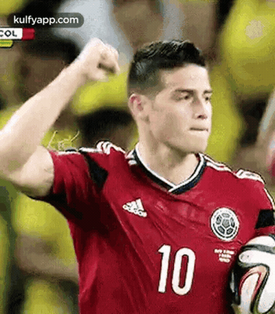 Soccer Player Red Jersey Number 10 Holding Ball GIF