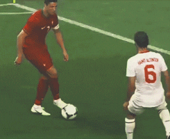 Soccer Player Ronaldo Dodging Opponent