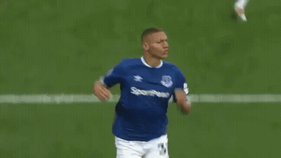Soccer Player Running In Blue And White Jersey GIF