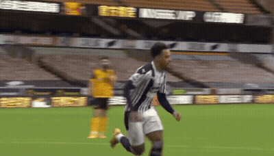 Soccer Player Running In Front Of Bwin Scoreboard GIF