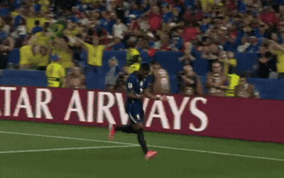 Soccer Player Running In Front Of Lenovo Ad GIF
