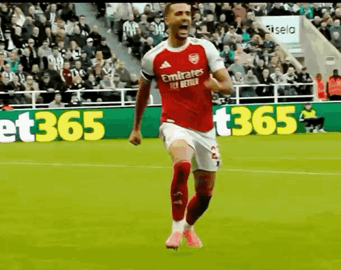 Soccer Player Running In Red Emirates Fly Better Jersey GIF