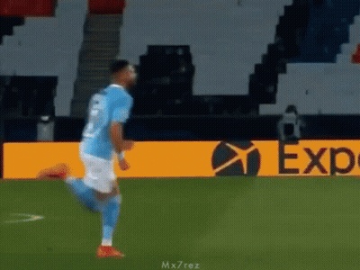 Soccer Player Running On Field Past Expedia Ad GIF