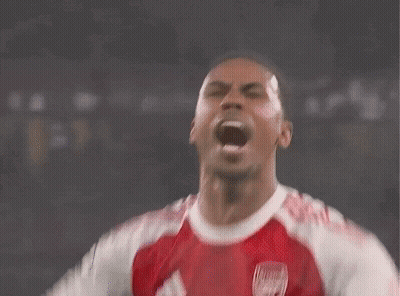 Soccer Player Screaming In Red Emirates Jersey GIF