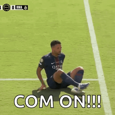 Soccer Player Sits On Field With Com On GIF