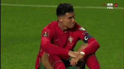 Soccer Player Sitting Head Down Hands On Knees GIF