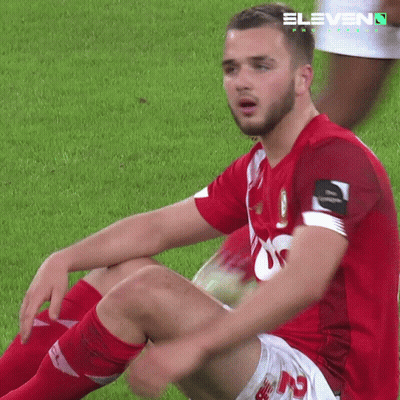 Soccer Player Sitting On Field With 11 On Jersey GIF