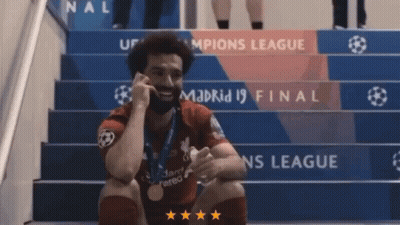 Soccer Player Sitting On Madrid Stairs GIF