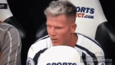 Soccer Player Sitting With Ball GIF
