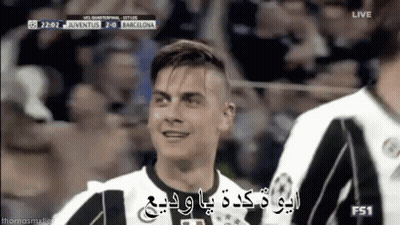 Soccer Player Smiling In Black And White Jersey GIF
