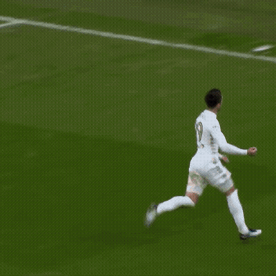 Soccer Player Standing In Front Of 32R Sign GIF