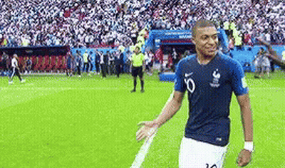 Soccer Player Standing In Front Of Crowd GIF