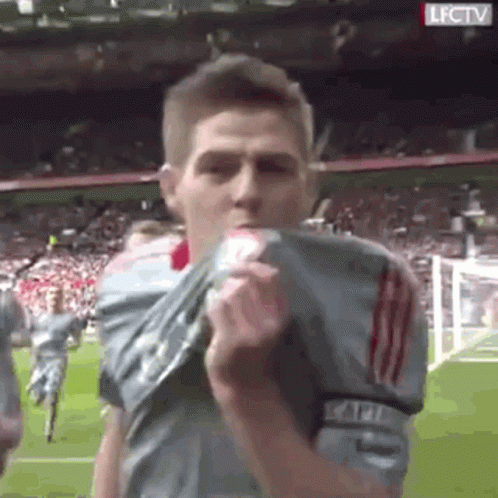 Soccer Player Taking Off Shirt GIF
