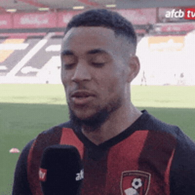 Soccer Player Talking Into Microphone GIF