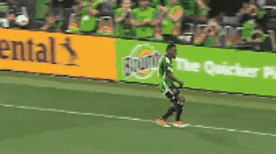 Soccer Player Walking In Front Of Continental Sign GIF